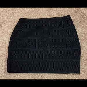 Black mini skirt with textured design